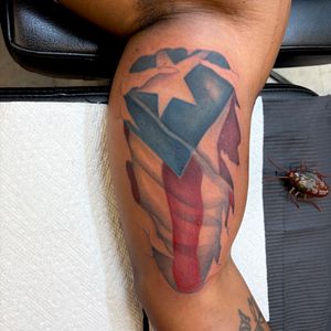 Color + Illustrative puerto rican flag tattoo on Upper Arm by 100inkz on TattMe