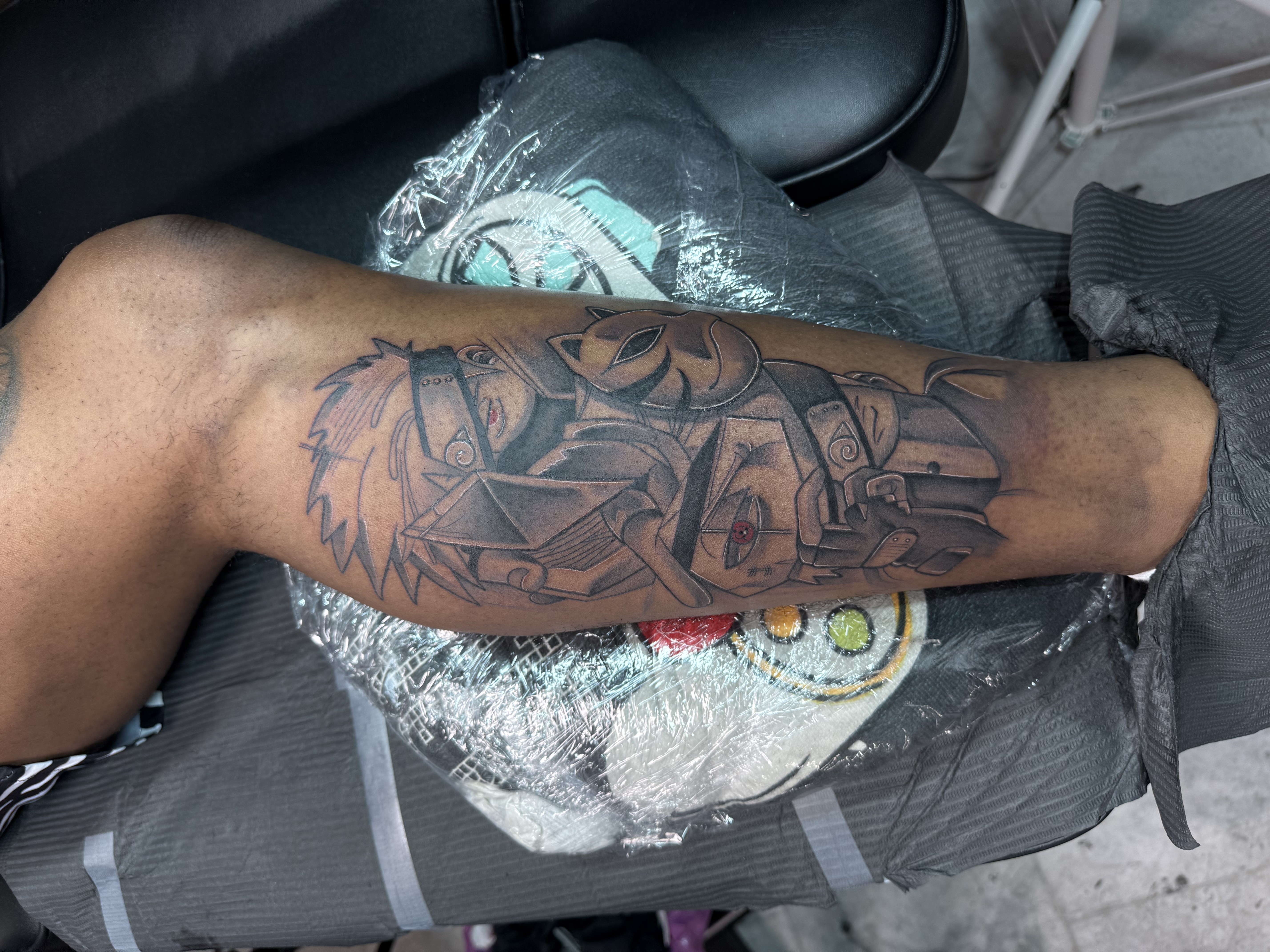 Anime + Black & Grey anime tattoo on Calf by 100inkz on TattMe