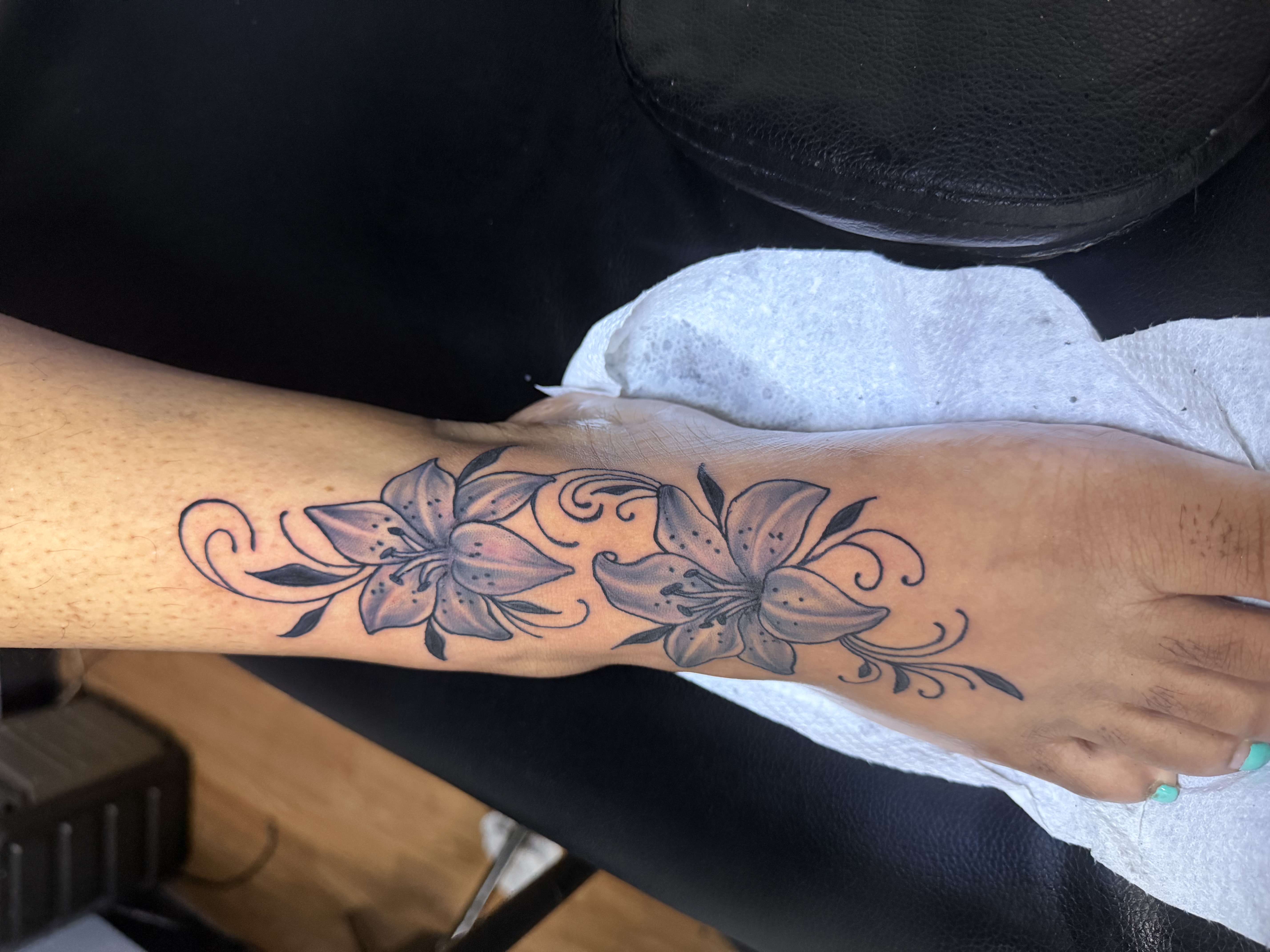 Black & Grey + Floral lilies tattoo on Ankle by TaeDavinci on TattMe