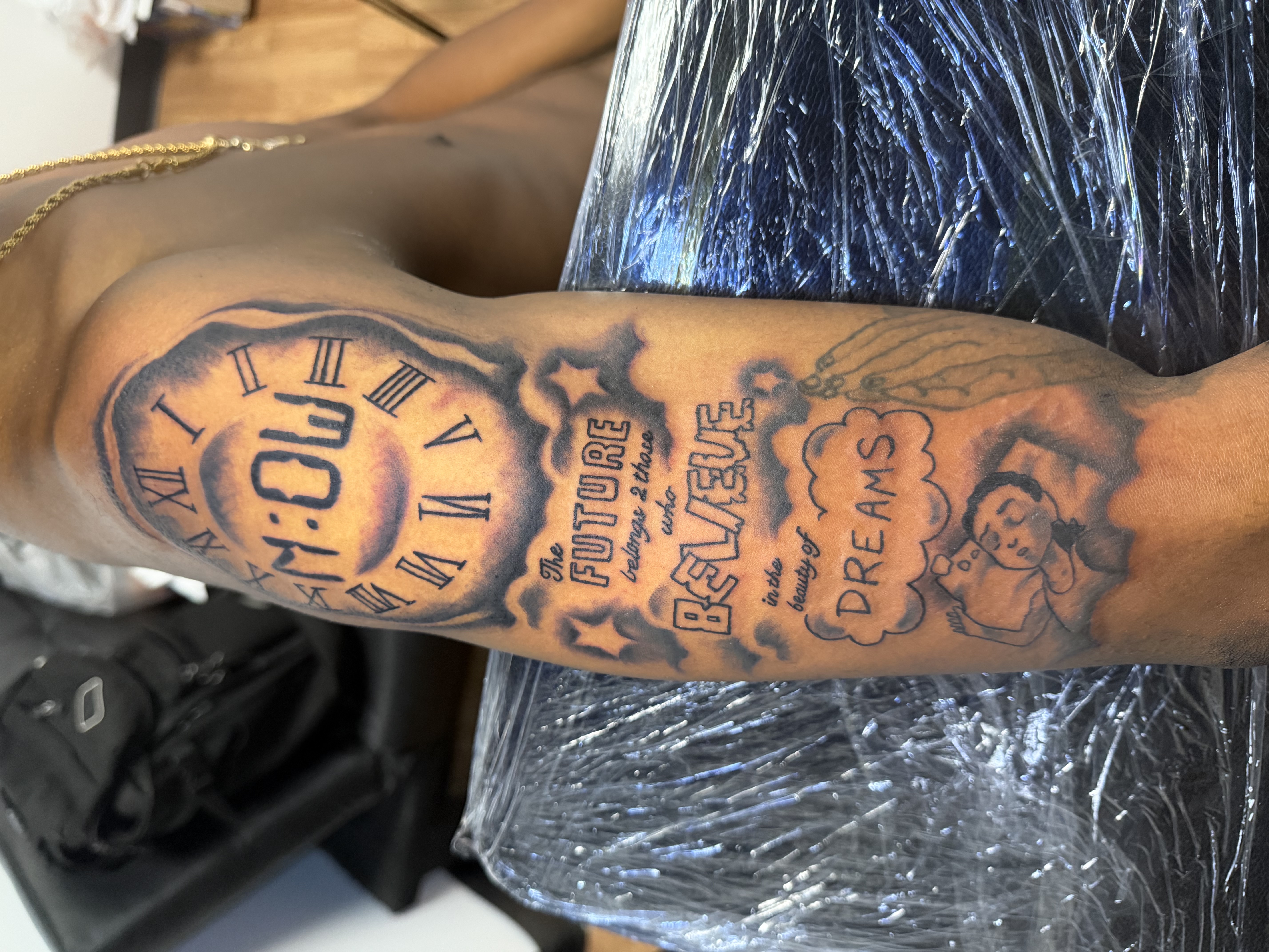 Black & Grey + Lettering clock tattoo on Upper Arm by TaeDavinci on TattMe