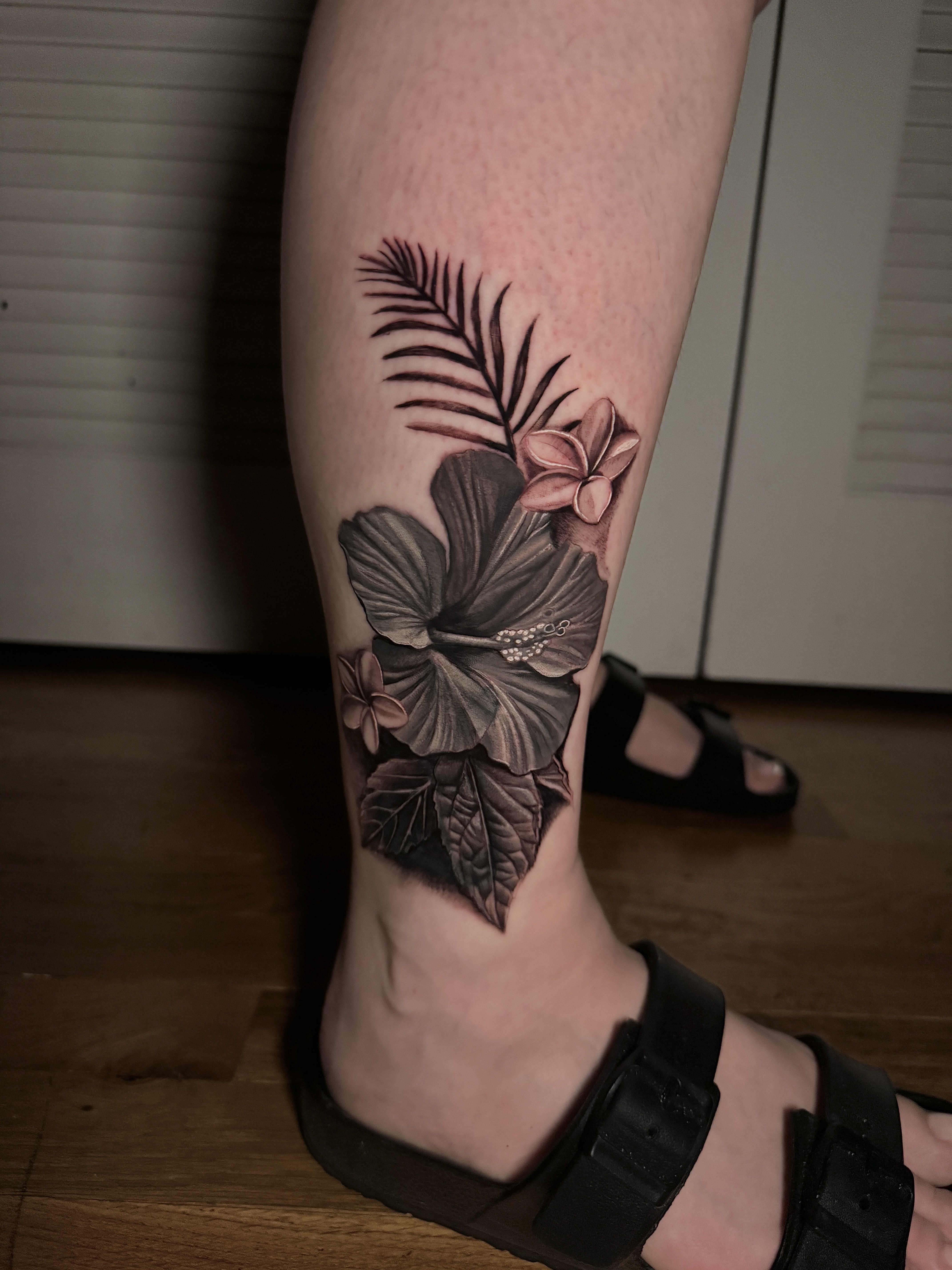 Black & Grey + Floral hibiscus tattoo on Calf by D-Artist on TattMe