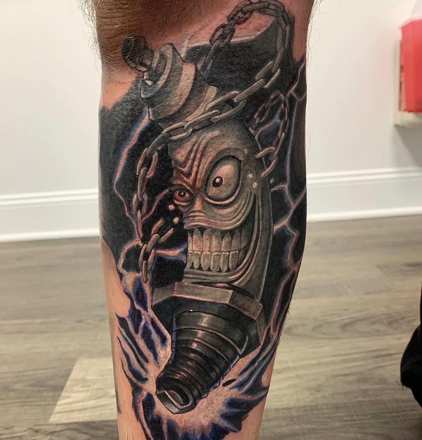 Illustrative + Black & Grey spark plug tattoo on Calf by D-Artist on TattMe