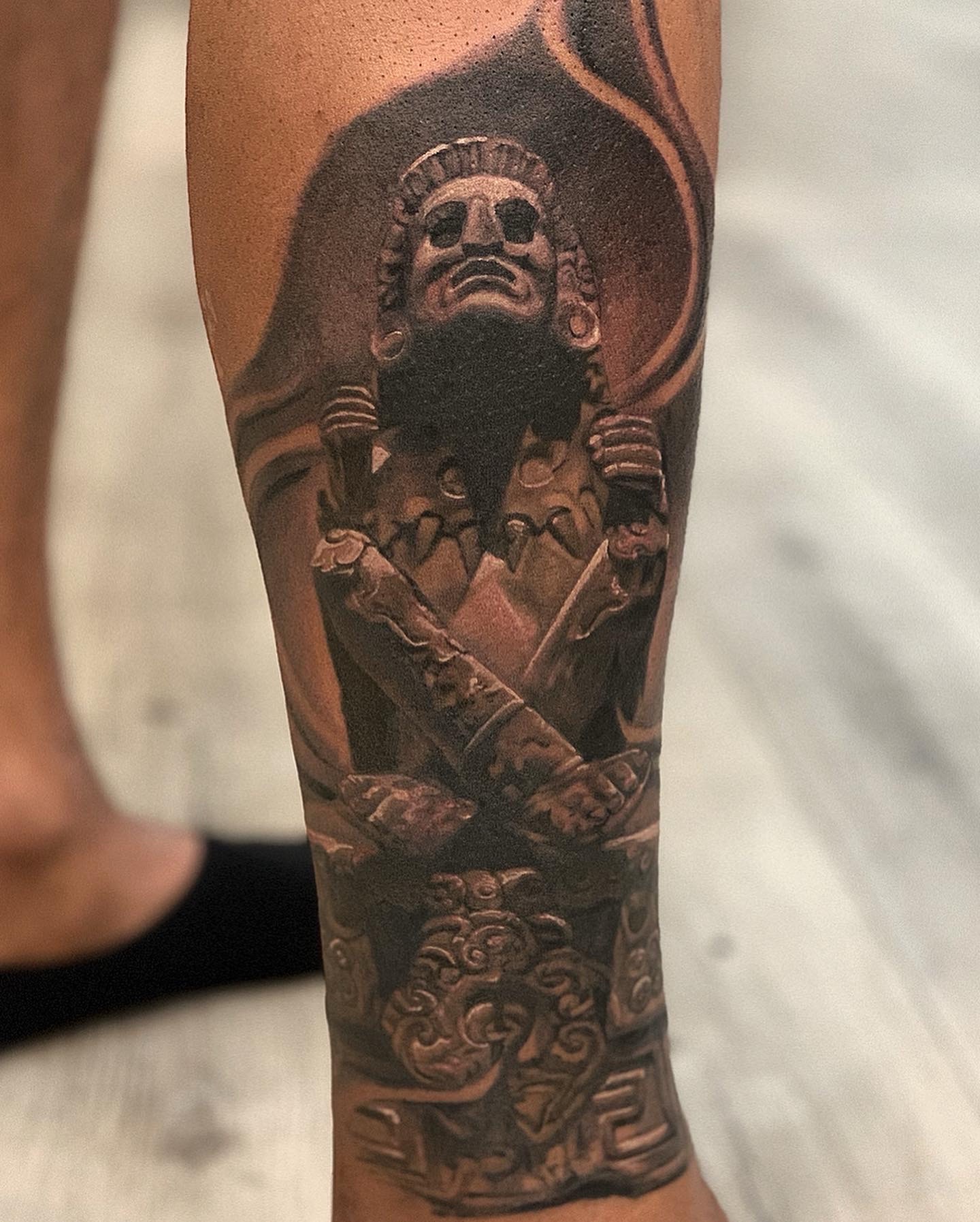 Black & Grey + Realism statue tattoo on Calf by D-Artist on TattMe