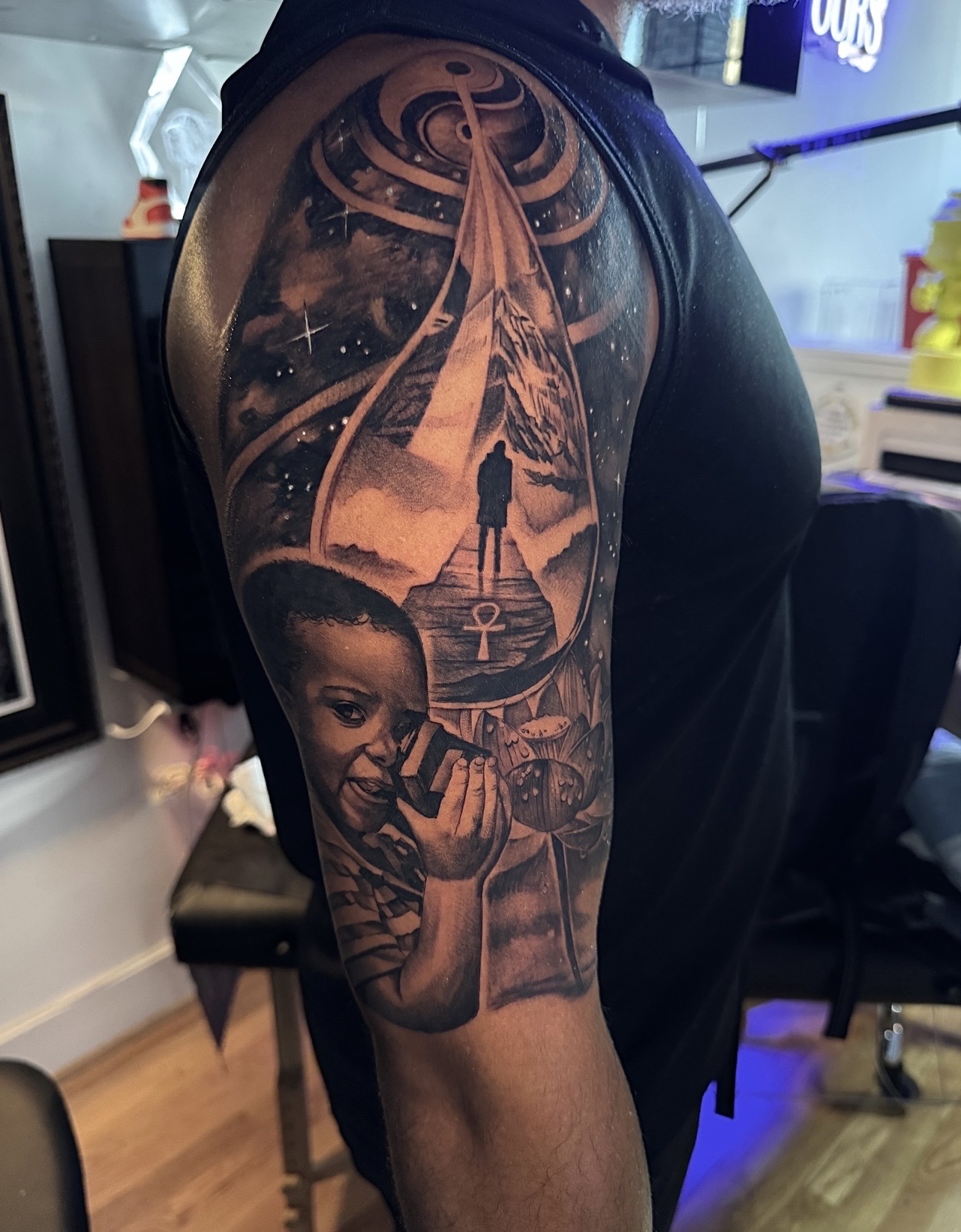 Black & Grey + Realism child tattoo on Upper Arm by D-Artist on TattMe