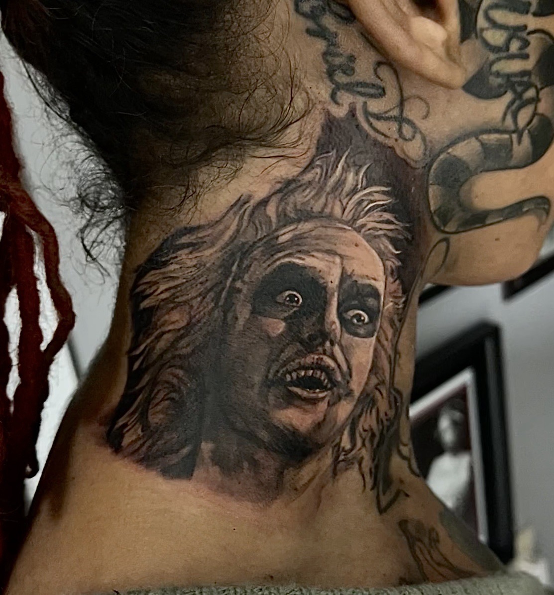 Realism + Black & Grey beetlejuice tattoo on Neck (Side) by D-Artist on TattMe