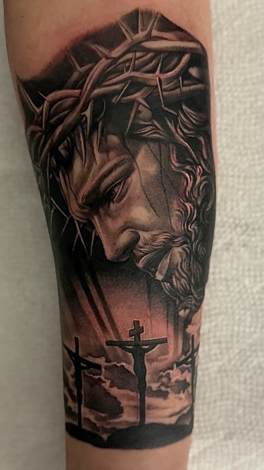 Realism + Black & Grey jesus tattoo on Forearm by D-Artist on TattMe