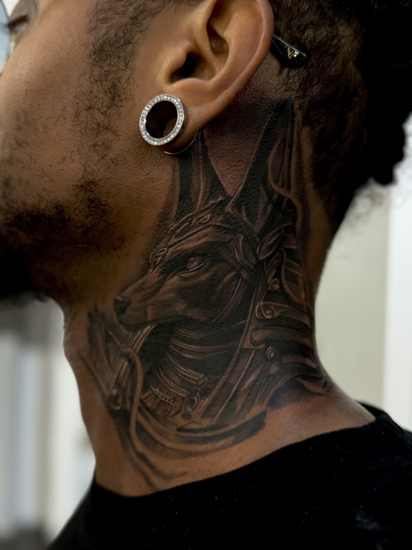 Black & Grey + Realism anubis tattoo on Neck (Side) by D-Artist on TattMe