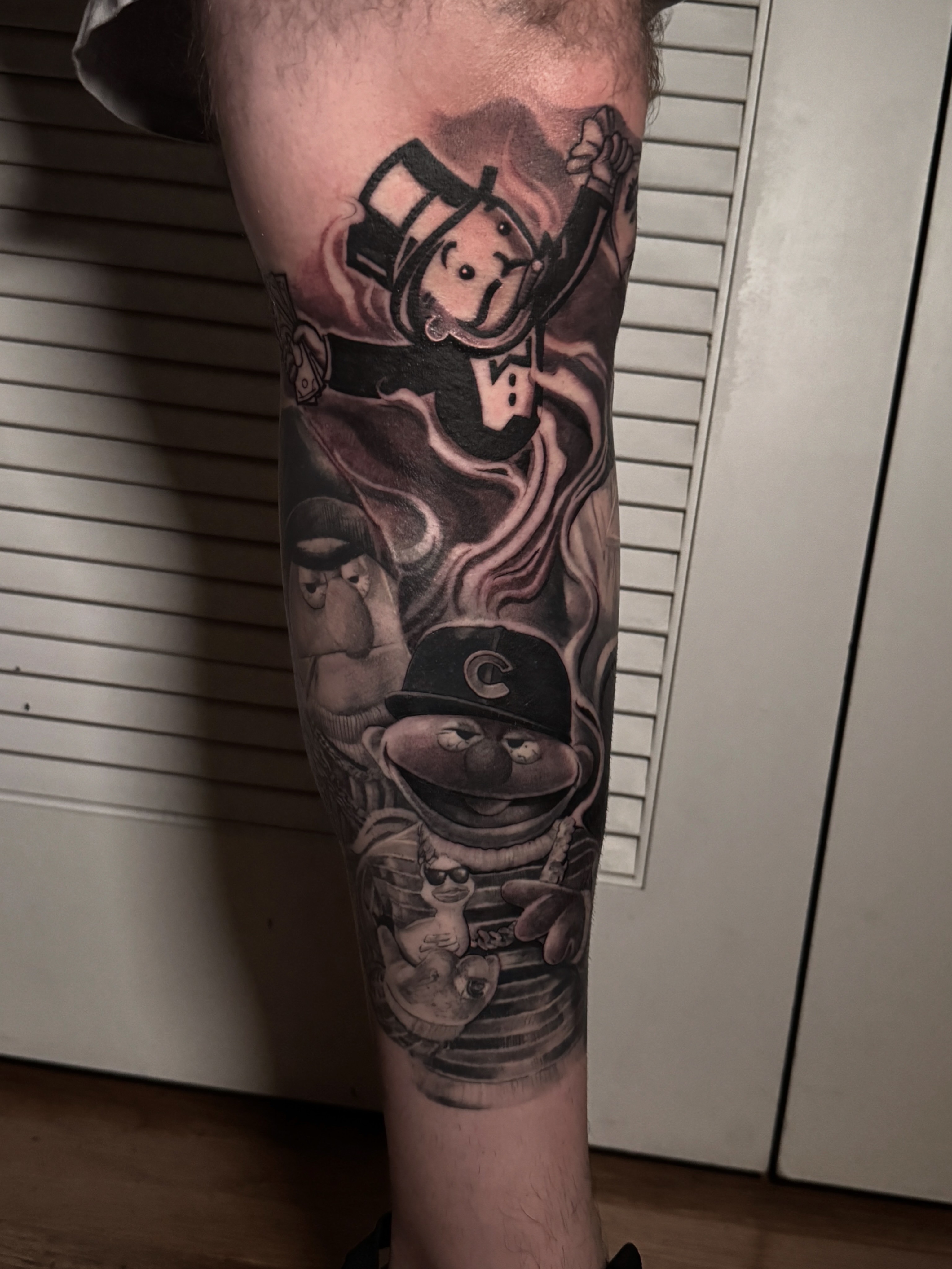 Black & Grey + Illustrative monopoly man tattoo on Calf by D-Artist on TattMe