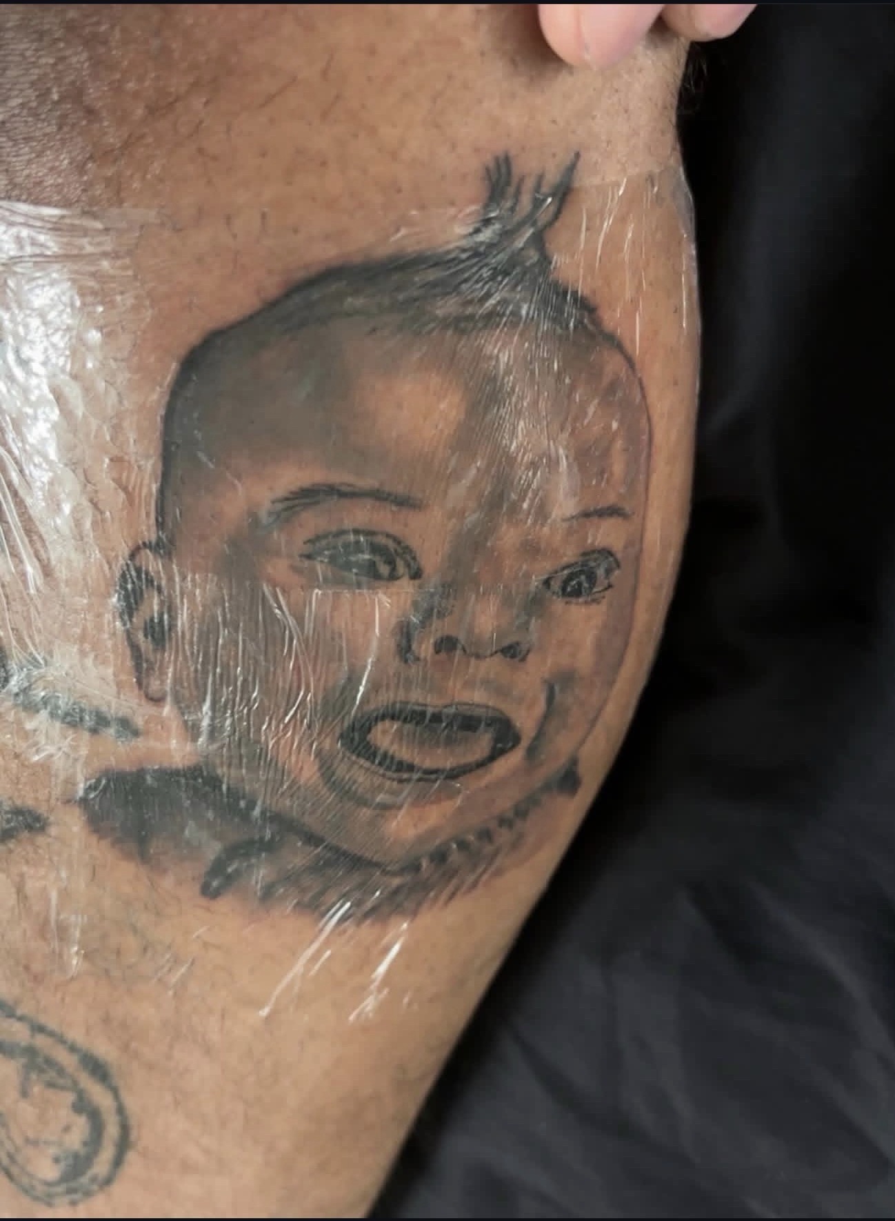 Black & Grey + Portrait Realism baby tattoo on Calf by gq_ink on TattMe