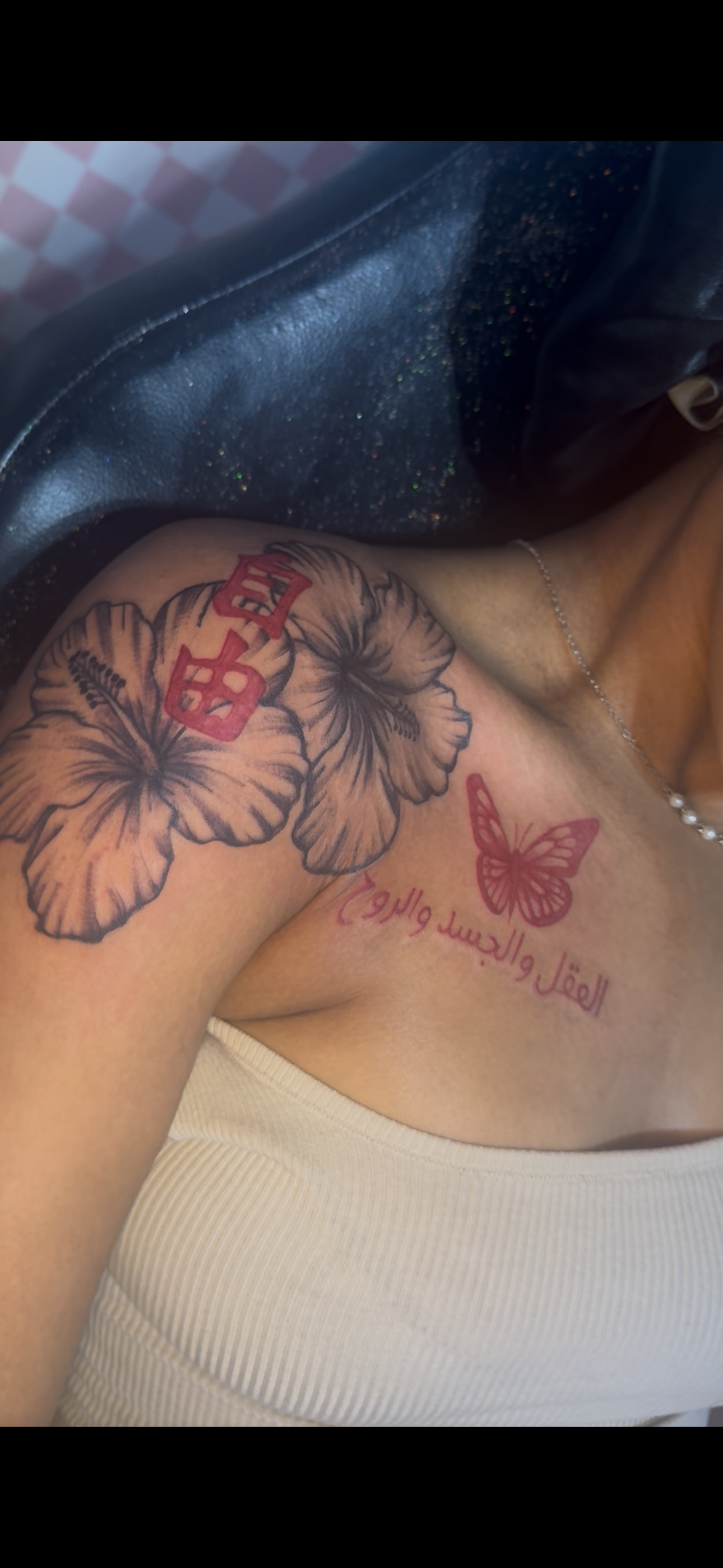 Floral + Black-work hibiscus tattoo on Shoulder by InkhyTatts on TattMe