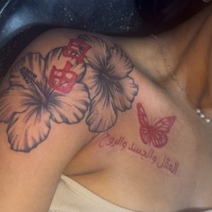 Floral + Black-work hibiscus tattoo on Shoulder by InkhyTatts on TattMe