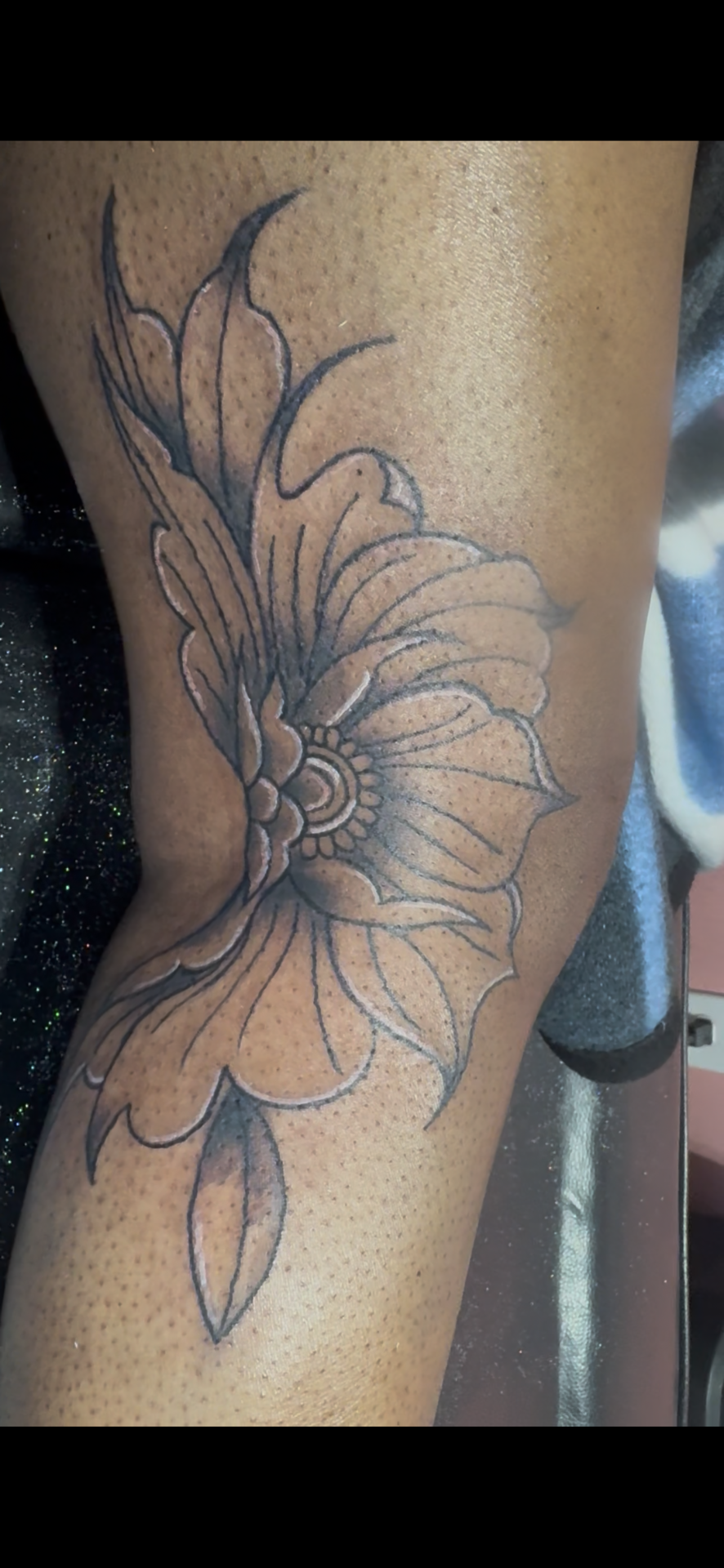 Fine Line + Black & Grey flower tattoo on Thigh by InkhyTatts on TattMe