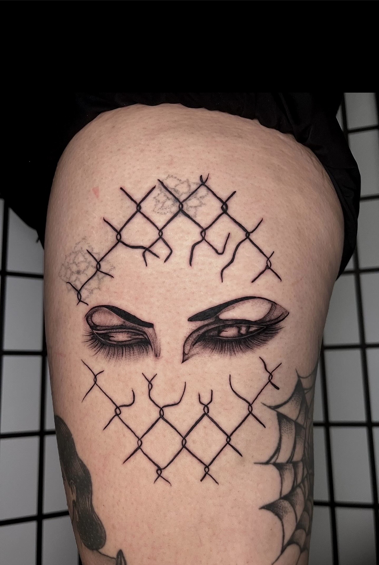 Fine Line + Black-work eyes tattoo on Thigh by Q_tattoo on TattMe