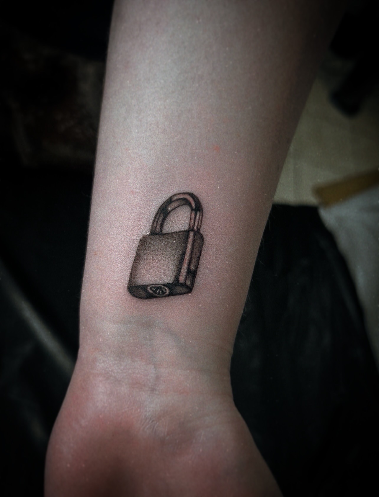 Black & Grey + Illustrative padlock tattoo on Wrist by Q_tattoo on TattMe