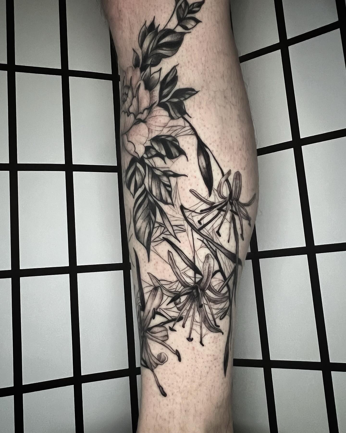 Floral + Fine Line flowers tattoo on Calf by Q_tattoo on TattMe