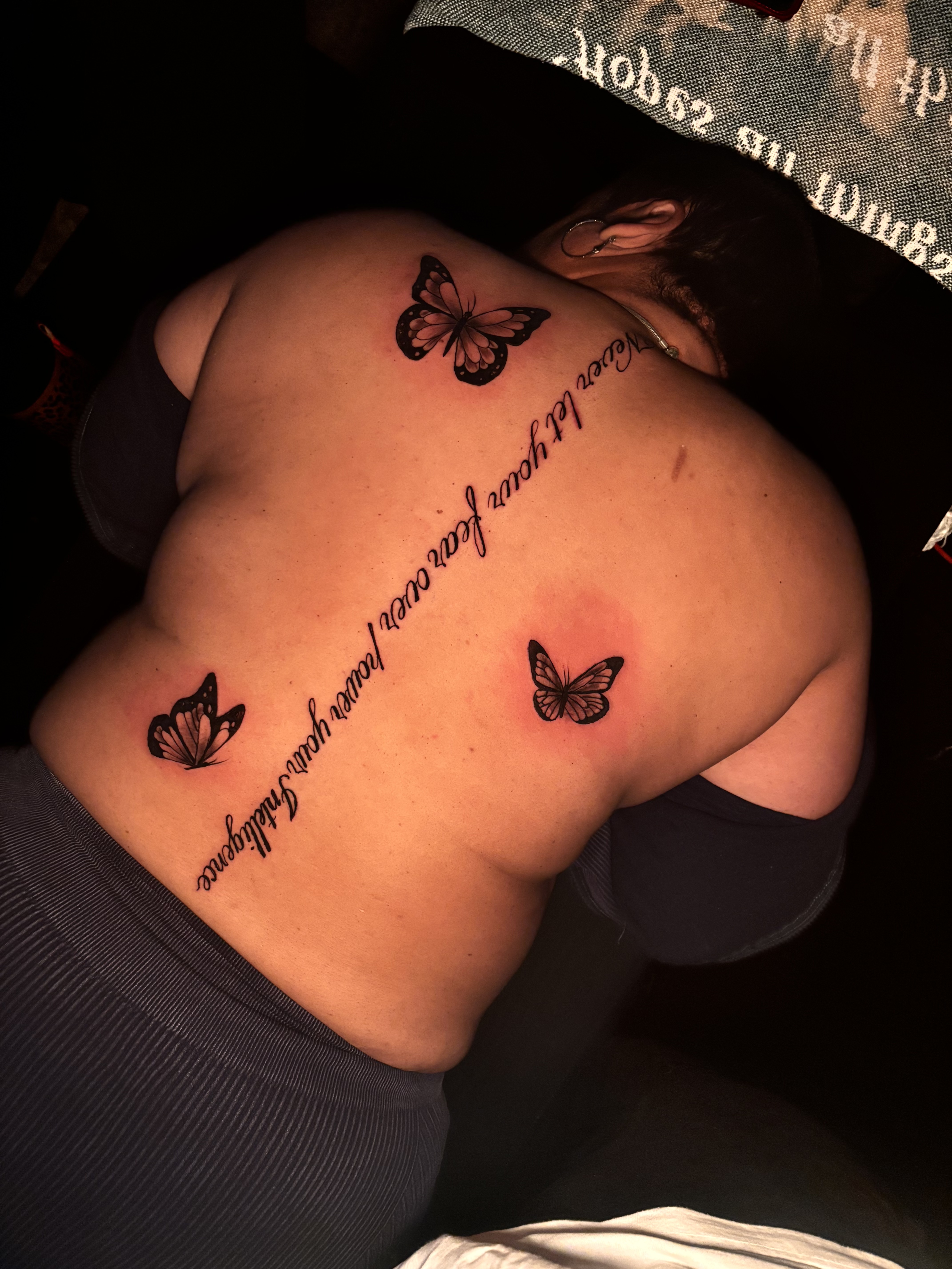 Lettering + Fine Line butterflies tattoo on Upper Back by Murda_Innk on TattMe