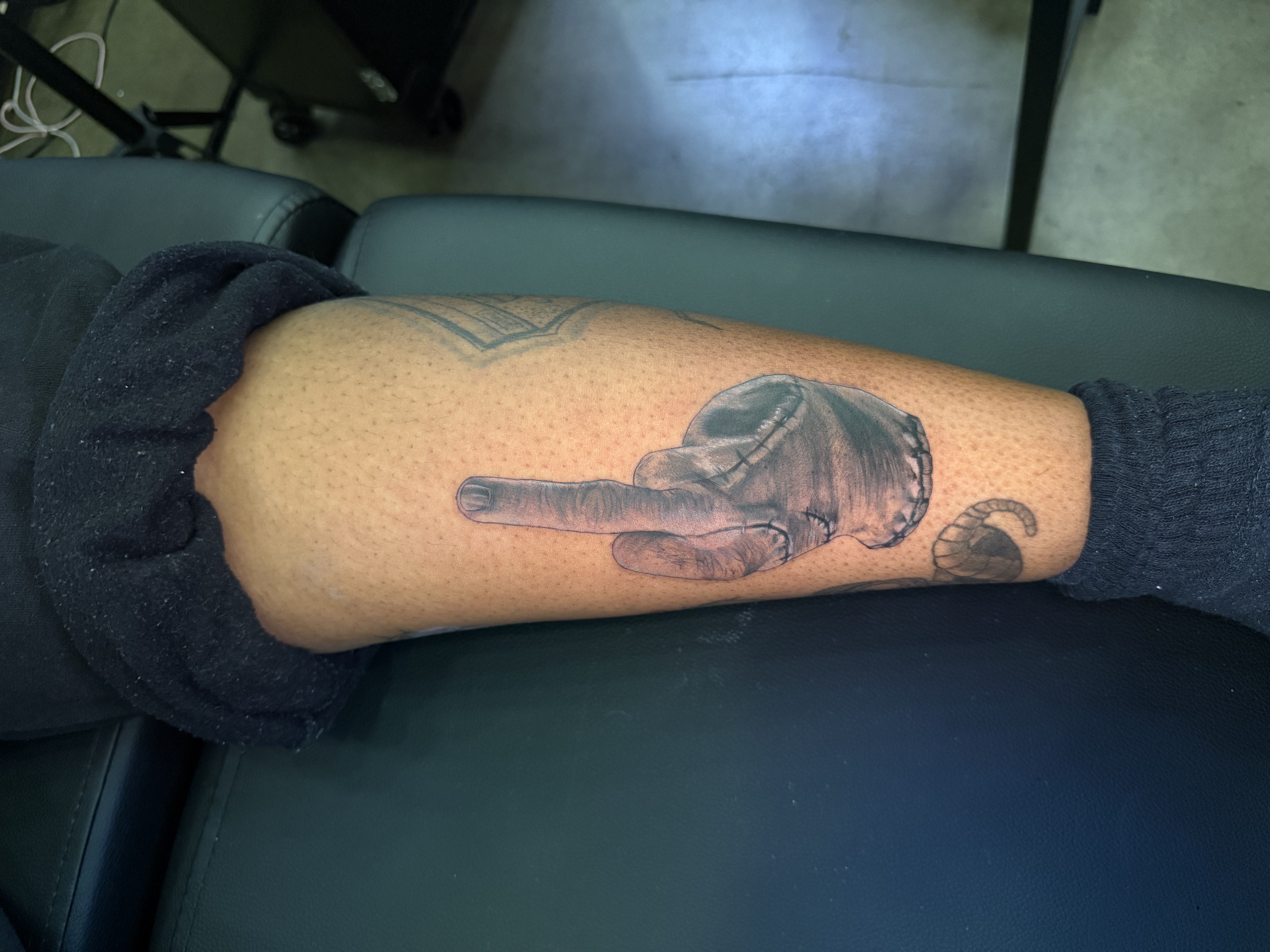 Black & Grey + Illustrative hand tattoo on Calf by nayasTats on TattMe