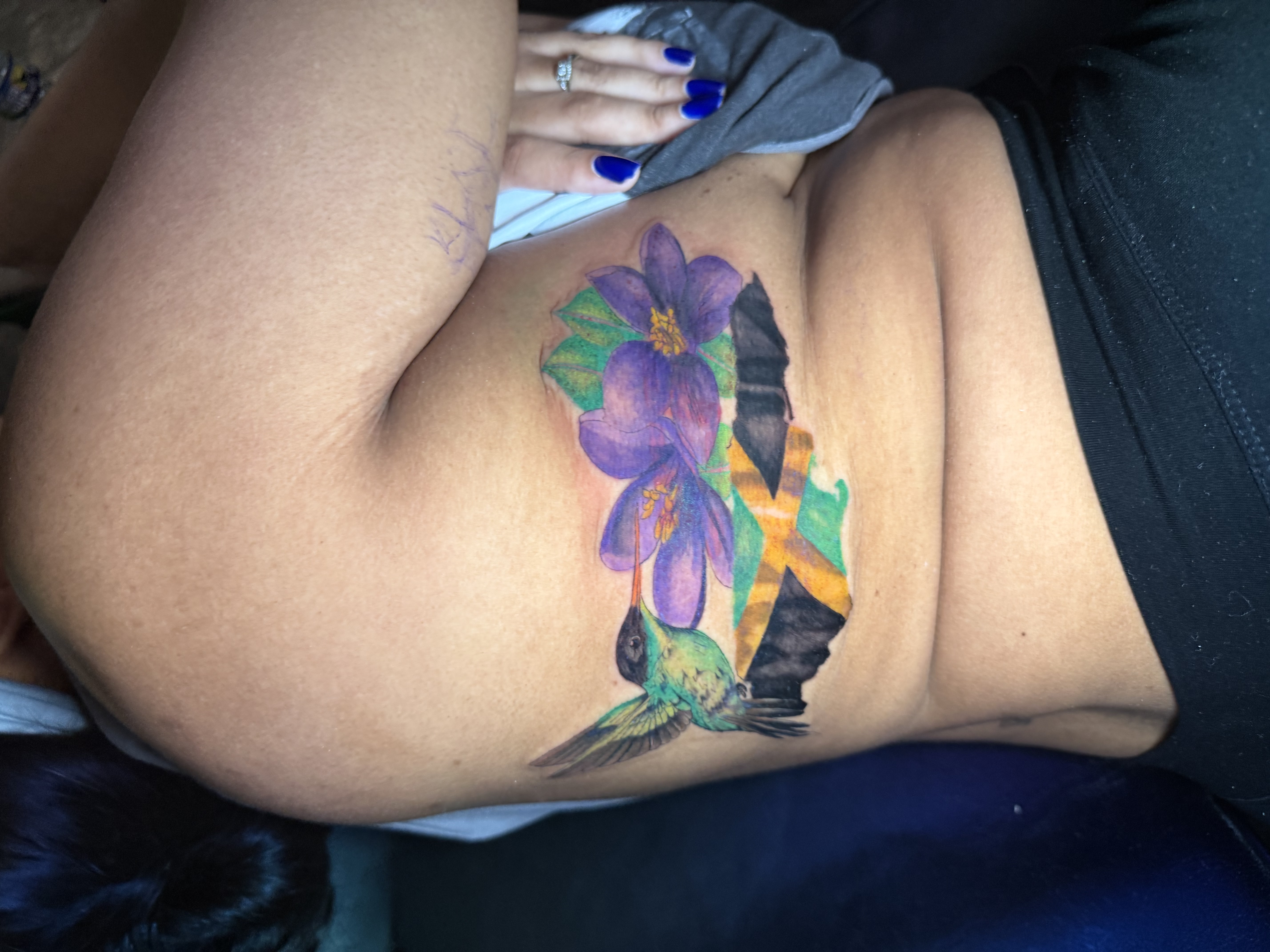 Color + Realism hummingbird tattoo on Ribs by nayasTats on TattMe
