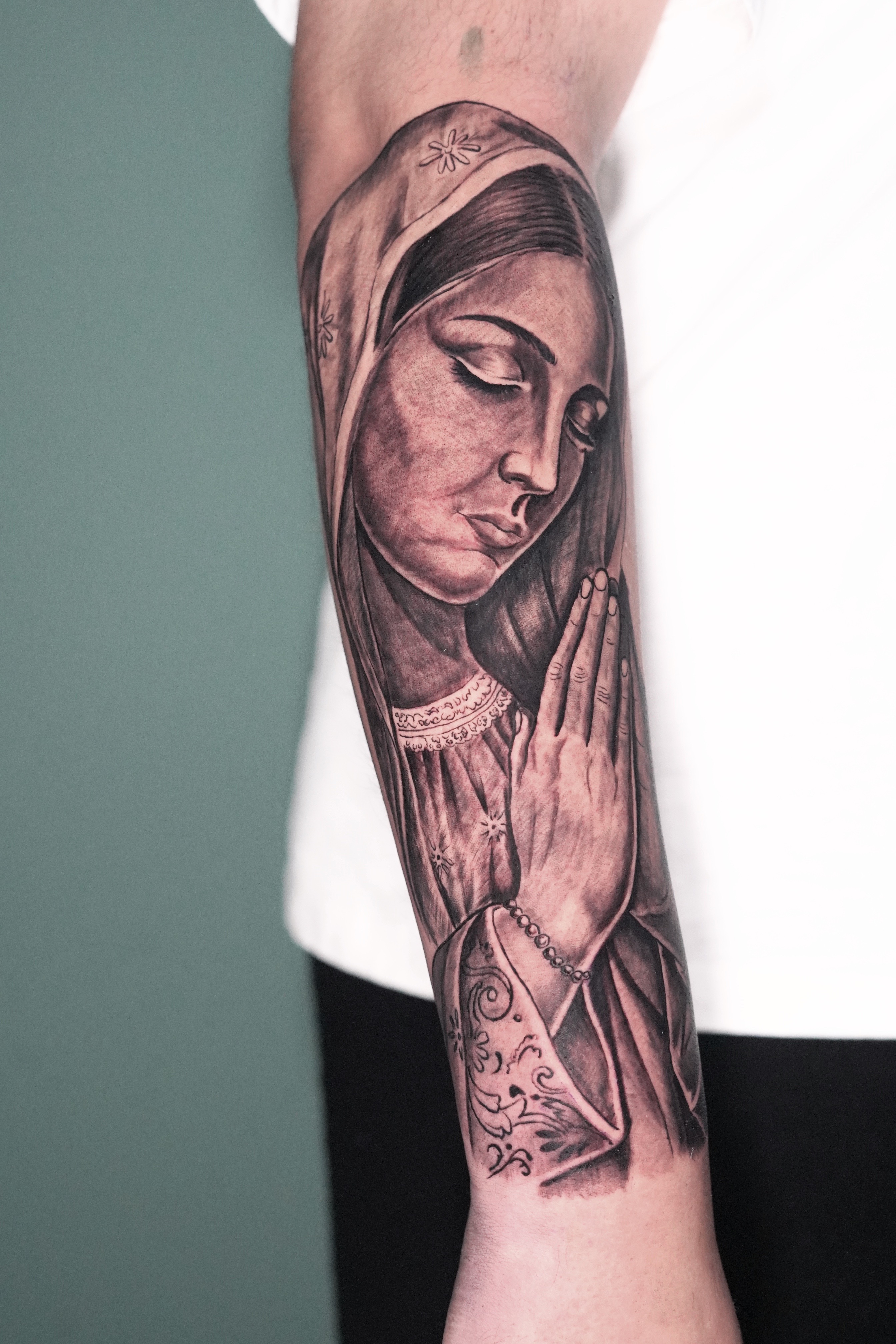 Black & Grey + Realism virgin mary tattoo on Upper Arm by victorm.tattoo on TattMe