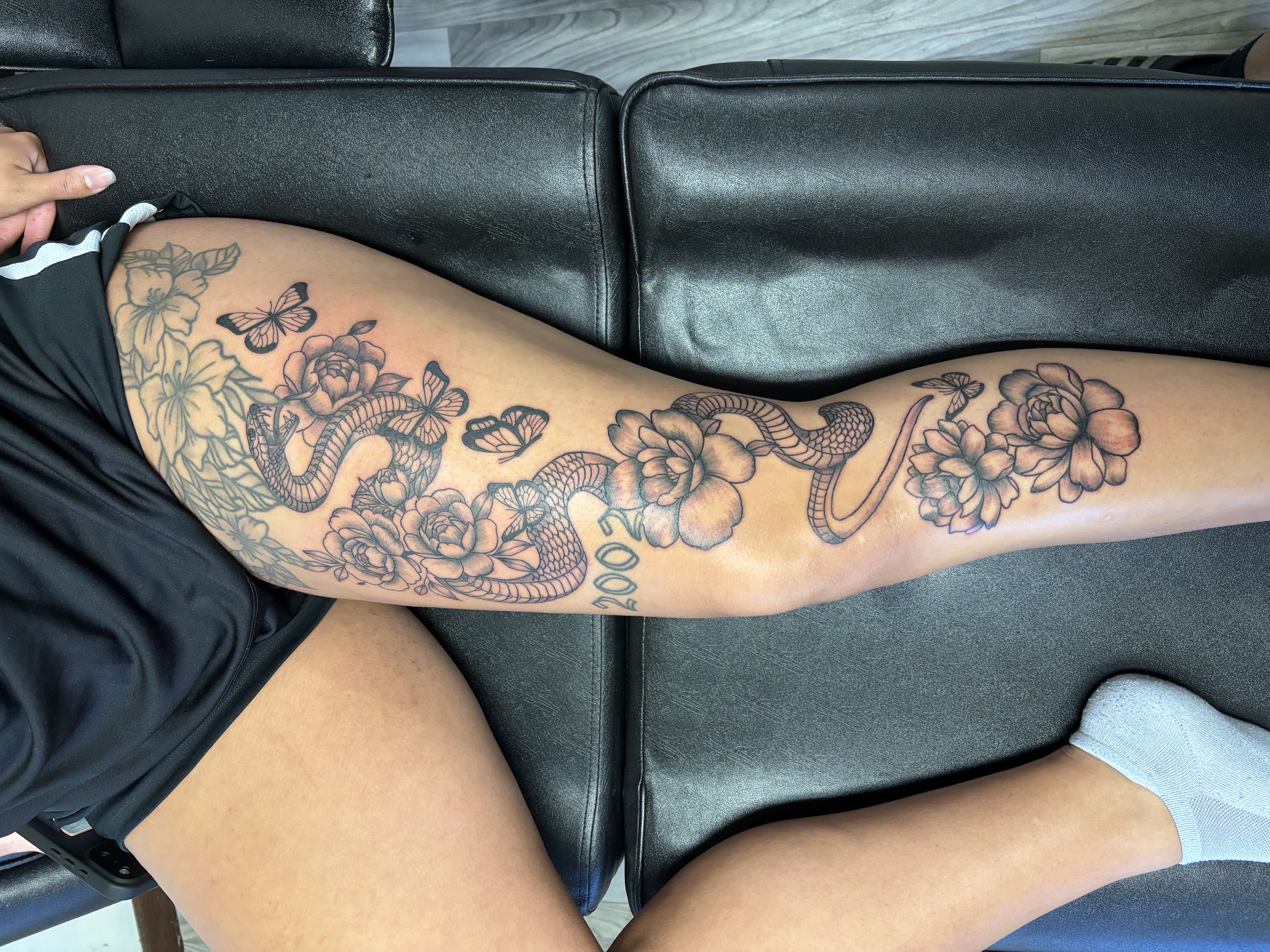 Fine Line + Black & Grey snake tattoo on Thigh by TatsByDaVinci on TattMe